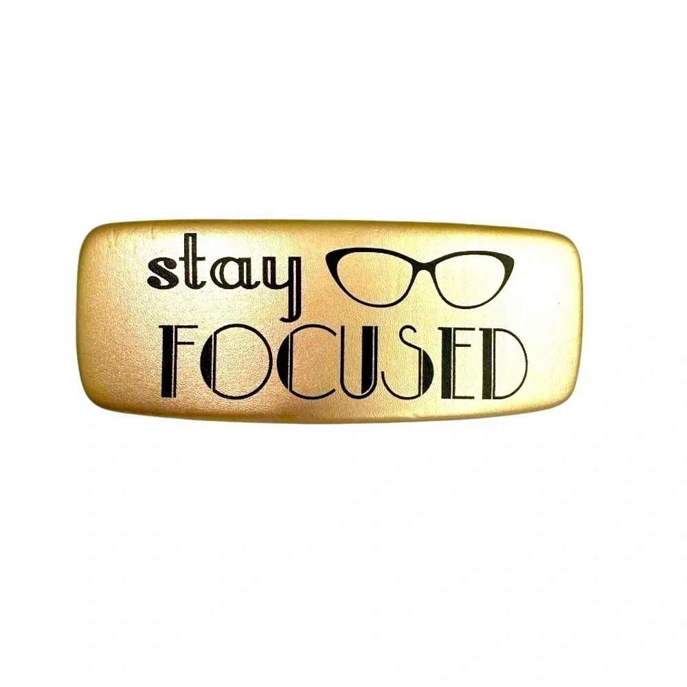 Gold Eyeglass Case with Black Text “ STAY FOCUSED”